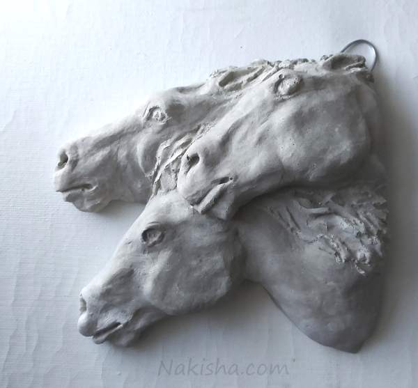 Concrete Horse wall Sculpture by Nakisha